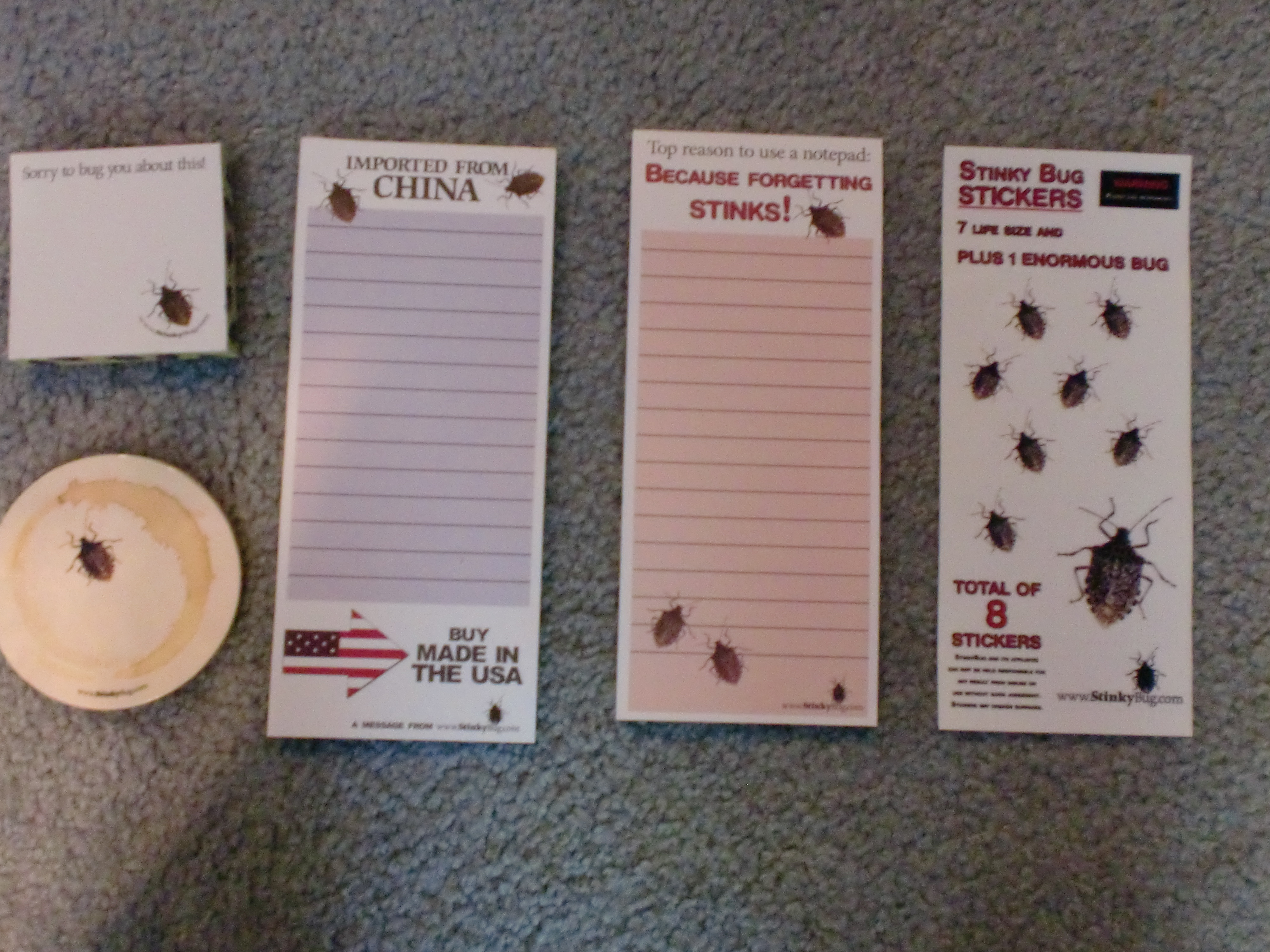 Stinkbug humor adorns notepads and coasters.
